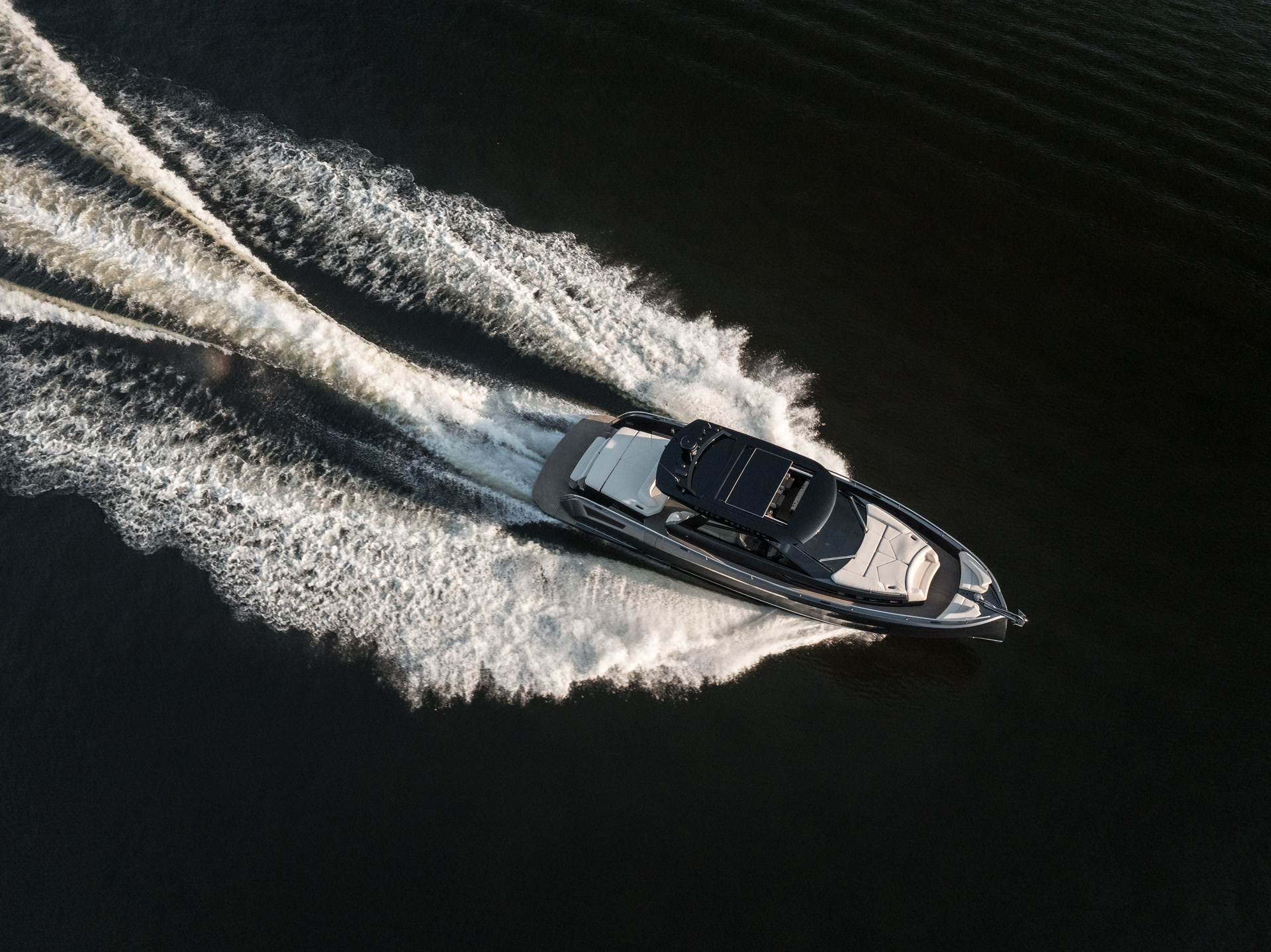 DA 50 overhead aerial showing dramatic dark water wake